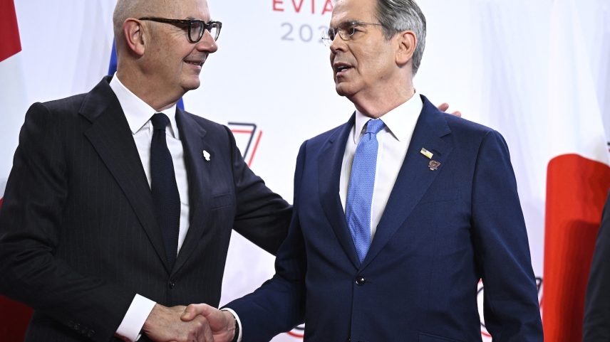 French Finance Minister Roland Lescure (left) shakes hands with U.S. Treasury Secretary Scott Bessent.