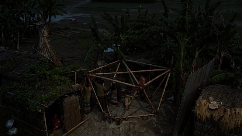 Em Bangladesh propenso a inundações, casas pequenas são feitas para acompanhar o rio