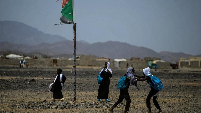 Students leave a school south of Port Sudan on April 26. More than 8 million children are out of school in the country, according to UNICEF.