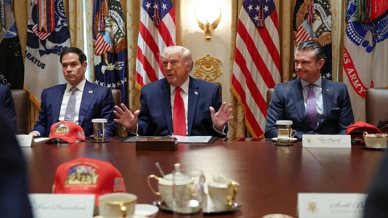 U.S. President Donald Trump speaks alongside Secretary of State Marco Rubio and Defense Secretary Pete Hegseth during a cabinet meeting at the White House.