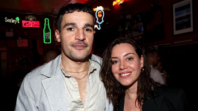 Christopher Abbott and Aubrey Plaza pose.