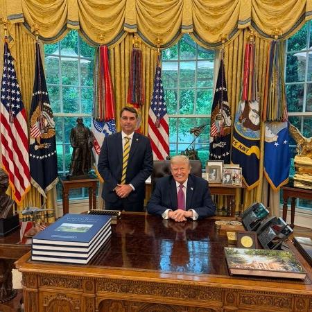 Vorcaro é o sujeito oculto na foto de Trump com Flávio Bolsonaro