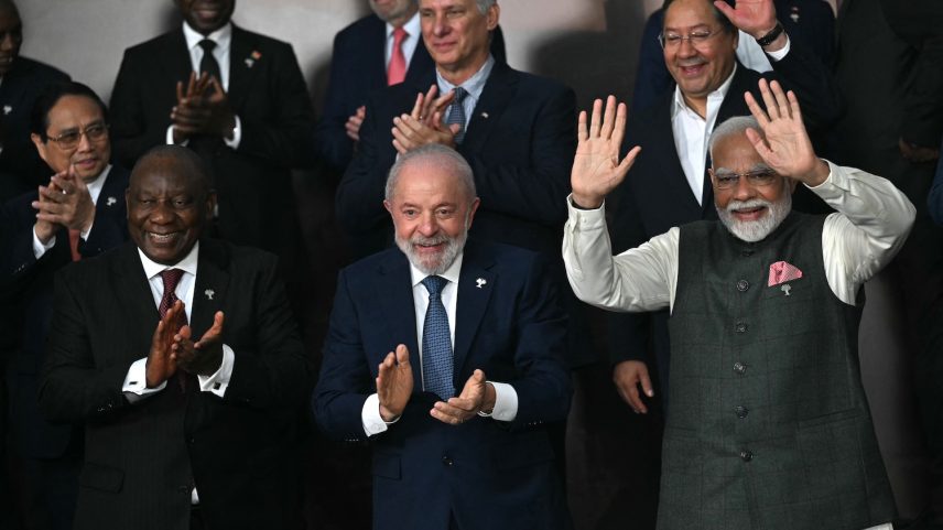 Indian Prime Minister Narendra Modi (first row, right) and other officials pose during the BRICS leaders' summit in Rio de Janeiro on July 7, 2025.