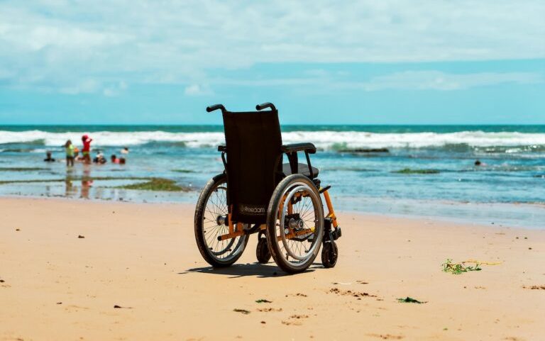 Banner image: Wheelchair on a beach. Image courtesy of Lucas Andrade via Pexels.