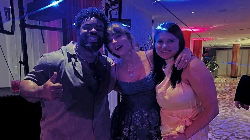Taylor Swift was spotted wearing a blue Zimmerman dress in viral photos from George Karlaftis’ Greece wedding, shared to social media (as seen above).