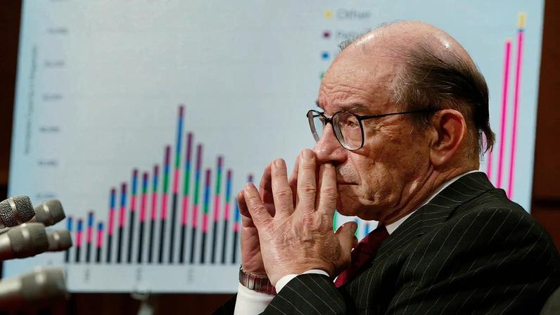 Alan Greenspan pauses while testifying on Capitol Hill in July 2003. He served as chair of the U.S. Federal Reserve from 1987 to 2006.