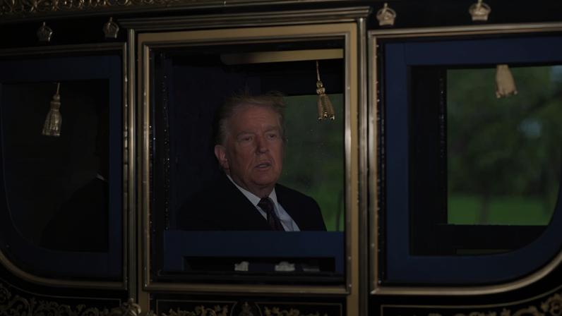 U.S. President Donald Trump joins the United Kingdom’s King Charles III during a carriage procession through the Windsor estate during a state visit in England on Sept. 17, 2025.