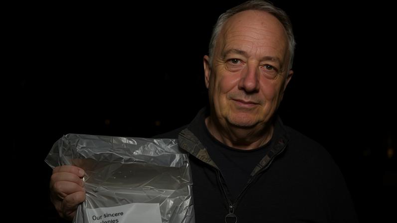 Paul Edwards from Chester with the bagged Royal Mail delivery containing a note of ‘sincere apologies’.
