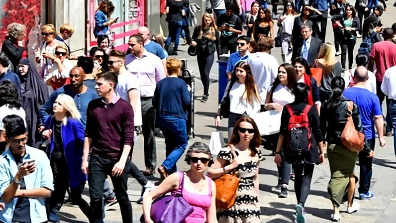 Shopping crowd of people in a busy Oxford Street