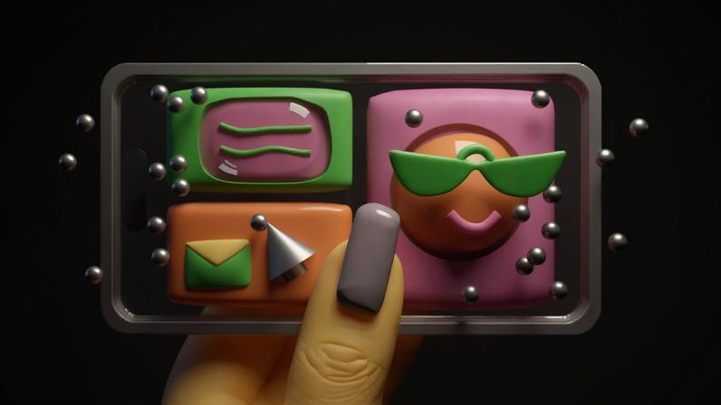 Hand holding a phone covered in anti-nausea dots.