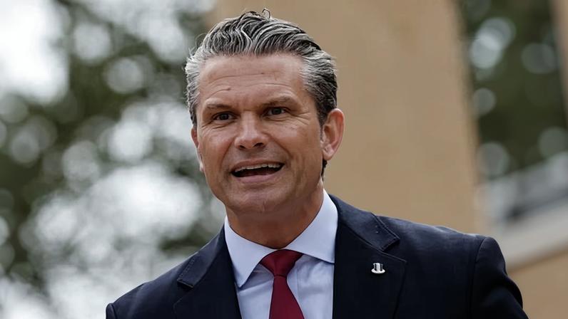 Pete Hegseth speaking at the American military cemetery in Colleville-sur-Mer on Saturday.