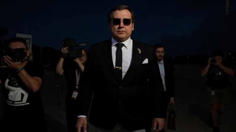 George Santos outside court in Suffolk county, New York in 2024. Santos was sentenced to seven years for fraud.