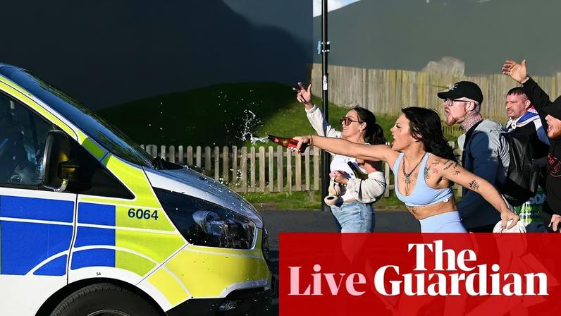 Demonstrators attack a police van following a protest march in Southampton.