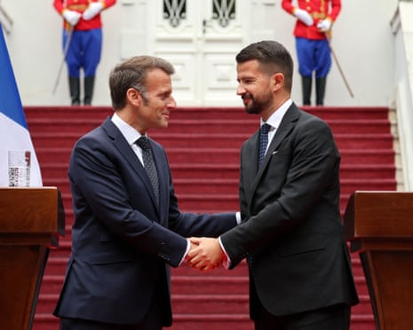 The French president, Emmanuel Macron, left, and Montenegro’s president, Jakov Milatović, at a press conference on Thursday in Cetinje.
