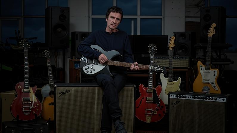 Please, please, please let me get what I want … Johnny Marr with some of the guitars to be included in the auction.
