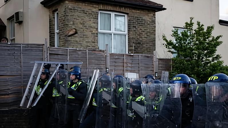 Police during clashes with protesters in Southampton on Tuesday evening.