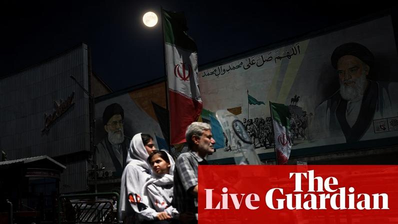 People ride past a mural depicting the late supreme leader, Ayatollah Ruhollah Khomeini, in Tehran. Follow the latest developments in the Middle East as the US and Iran exchanged fresh strikes, live.