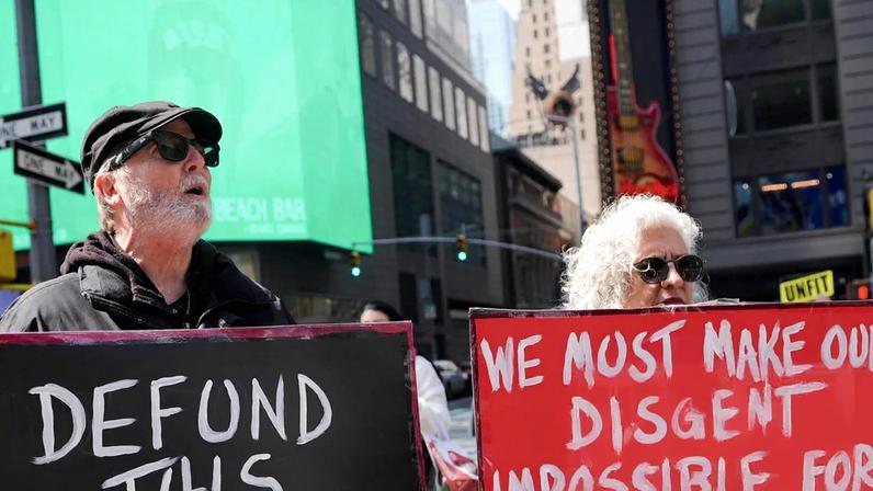 Demonstrators hold a protest against the war on Iran next in Times Square in New York City on 22 March 2026.