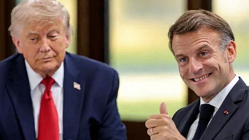 Emmanuel Macron gives a thumbs up as Donald Trump looks on at the G7 summit in France.
