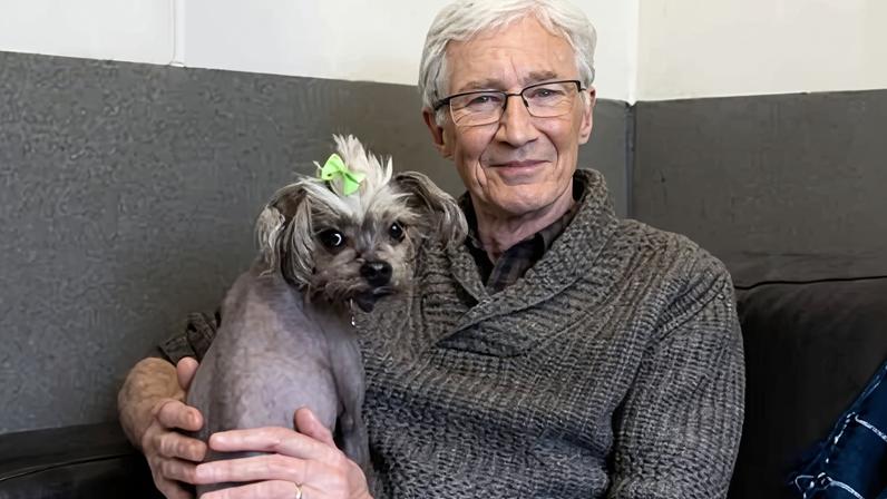 Paul O'Grady with a Chinese crested dog called Cindy in Paul O'Grady's For the Love of Dogs in 2022.