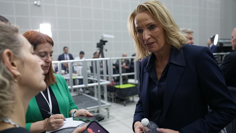 The Reform MP Sarah Pochin speaking to the media at the Makerfield byelection count, where she clashed with the Labour peer Thangam Debbonaire.