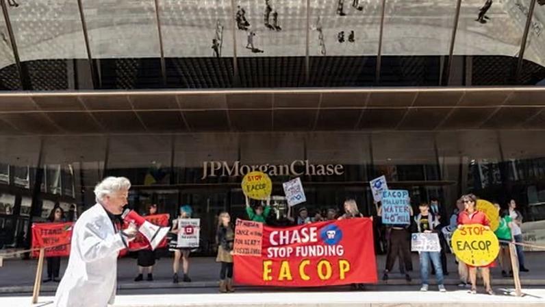 Climate activists protesting against Chase bank's support of Total Energies' East African Crude Oil Pipeline (EACOP) rally at JPMorgan Chase headquarters in Manhattan on 29 May 2026.
