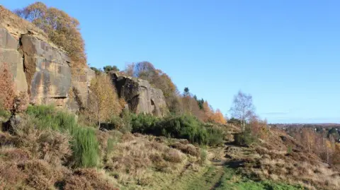 Bradford Council A rock face with moorland and a few trees