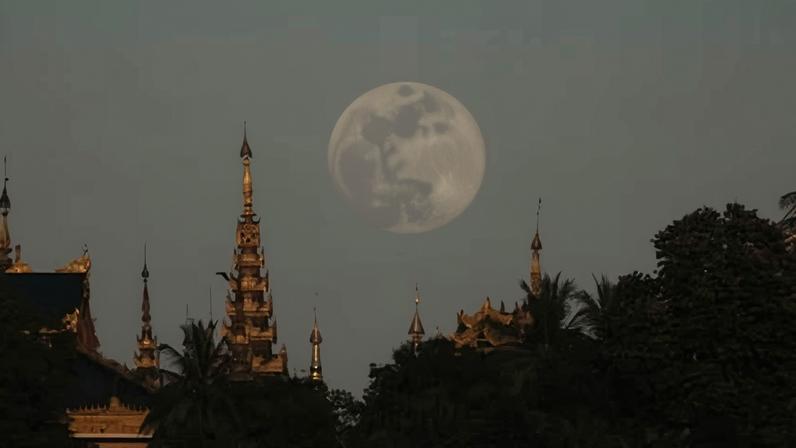 The supermoon rise near Myanmar Landmark Shwedagon during the full moon day of Tazaungmone, also known as lighting festival, on 15 November 2024, in Yangon, Myanmar.