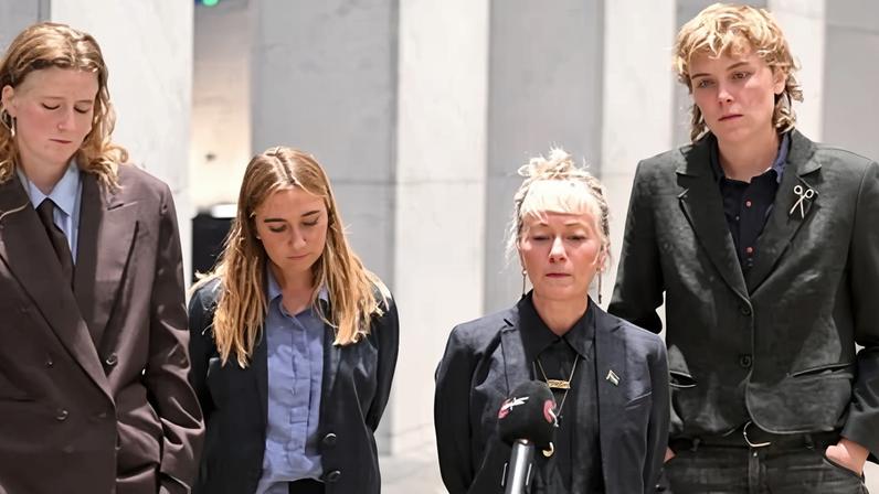 Australian activists Neve O'Connor, Luca Lamont, Juliet Lamont and Gemma O’Toole speak to media yesterday after meeting with the foreign affairs minister, Penny Wong.