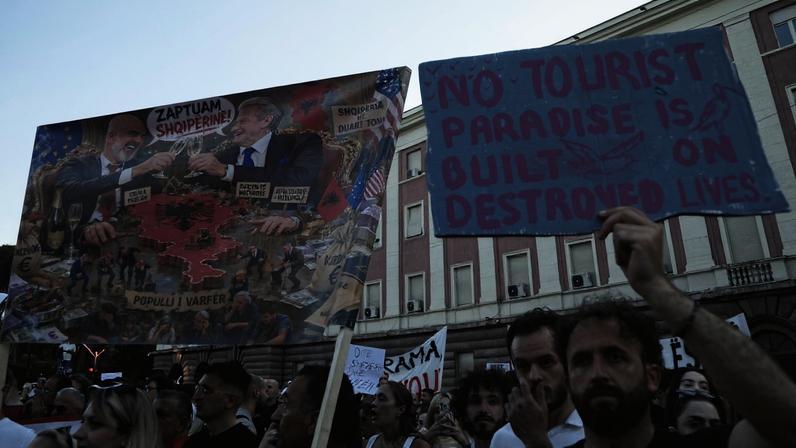Protesters demonstrate in front of the prime minister’s office in Tirana, Albania, on June 6 against the construction of a luxury resort near a protected natural area.