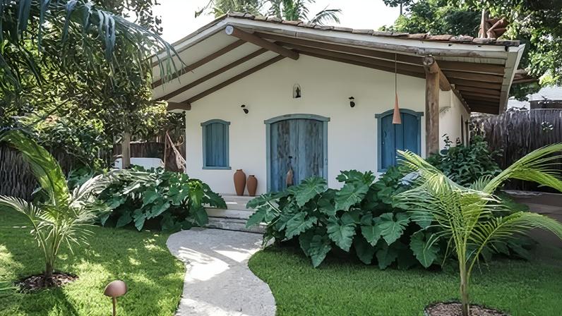Fachada de um dos bangalôs da Vila Oyá