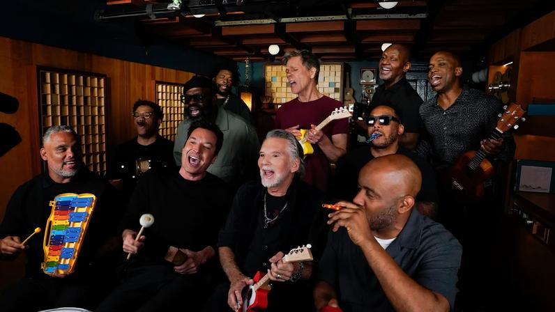Jimmy Fallon, Kenny Loggins, Kevin Bacon, and the Roots performing on 'The Tonight Show.'