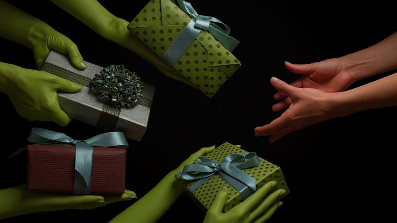 Hands give presents to an expectant empty hand.