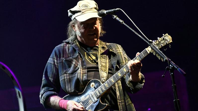 Neil Young performs on the Pyramid stage during day four of Glastonbury festival 2025 at Worthy Farm, Pilton on June 28, 2025 in Glastonbury, England. Established by Michael Eavis in 1970, Glastonbury has grown into the UK's largest music festival, drawing over 200,000 fans to enjoy performances across more than 100 stages. In 2026, the festival will take a fallow year, a planned pause to allow the Worthy Farm site time to rest and recover.