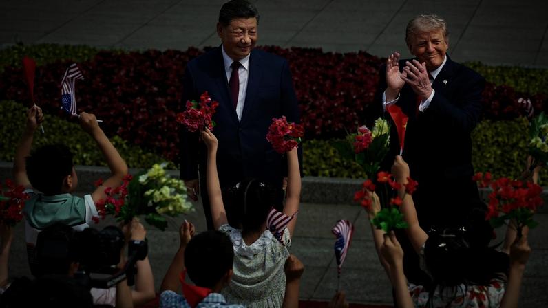U.S. President Donald Trump and Chinese President Xi Jinping attend a welcome ceremony at the Great Hall of the People in Beijing on May 14.