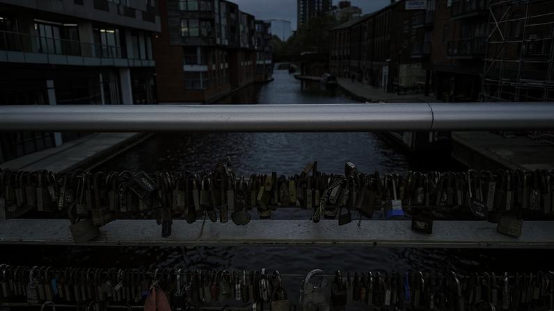 Locks adorn a bridge over one of the many canals in Birmingham, England.