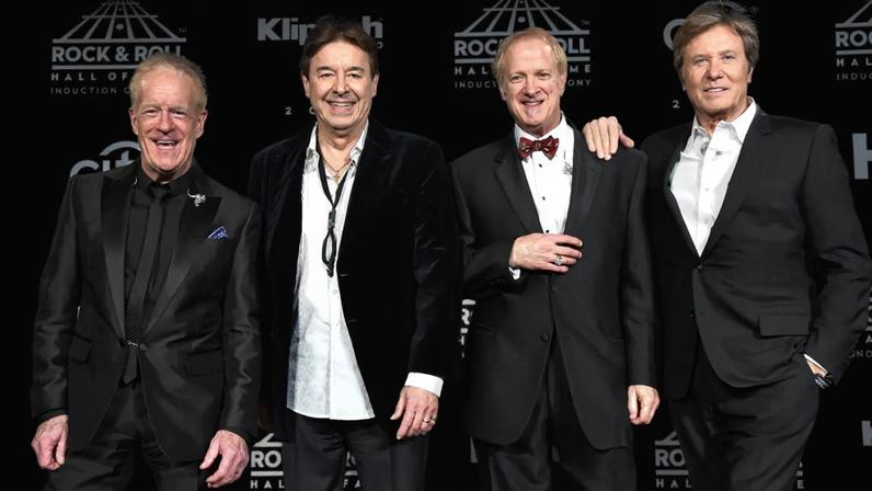 NEW YORK, NEW YORK - APRIL 08: (L-R) Inductees James Pankow, Walter Parazaider, Lee Loughnane and Robert Lamm of Chicago pose on stage in the press room at the 31st Annual Rock And Roll Hall Of Fame Induction Ceremony at Barclays Center on April 8, 2016 in New York City.