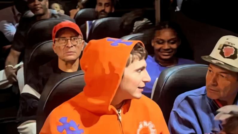 Celebrities packing onto a bus for the Knicks championship parade.