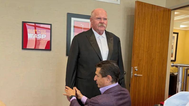 Andy Reid is ready for his close-up after getting fitted for his tuxedo to wear to Taylor Swift and Travis Kelce’s wedding.