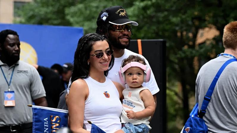 Jalen Brunson with his wife and daughter
