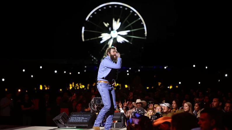 Post Malone performing on stage at the Stagecoach Festival.