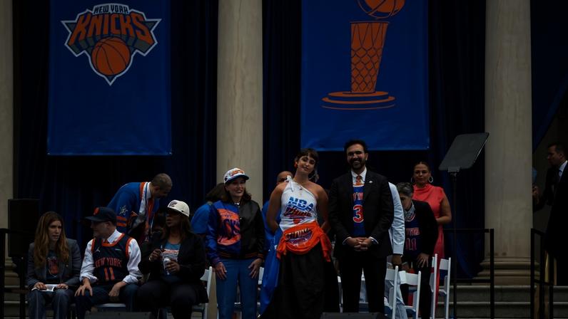Rama Duwaji took the Knicks championship parade stage in a custom Miss Claire Sullivan dress on Thursday.