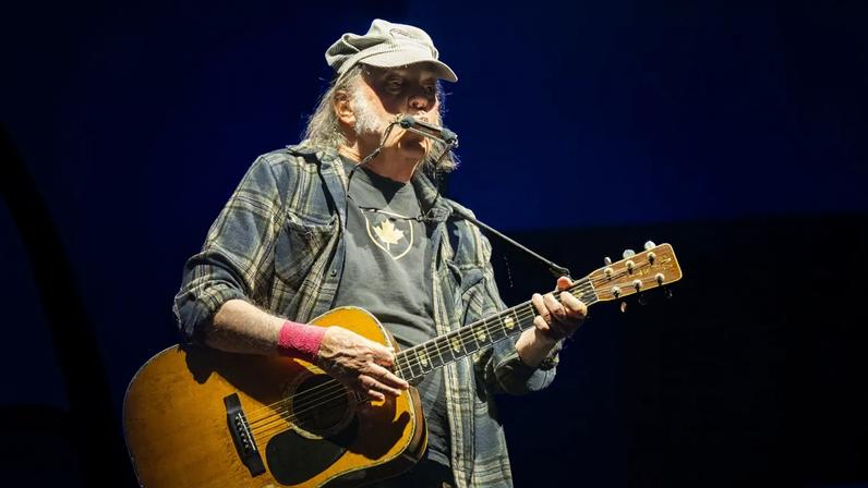 Neil Young performs on the Pyramid stage during day four of Glastonbury festival 2025 at Worthy Farm, Pilton on June 28, 2025 in Glastonbury, England. Established by Michael Eavis in 1970, Glastonbury has grown into the UK's largest music festival, drawing over 200,000 fans to enjoy performances across more than 100 stages. In 2026, the festival will take a fallow year, a planned pause to allow the Worthy Farm site time to rest and recover.