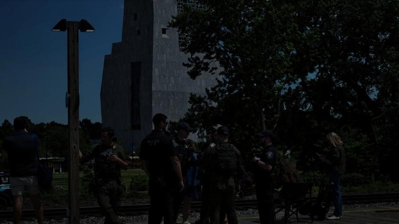 Law enforcement officers stand guard near the Obama Presidential Center in Chicago, Illinois, on June 18.