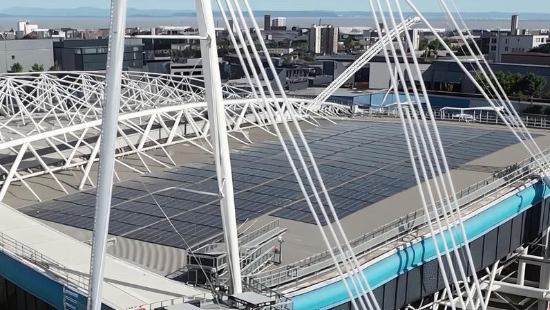 The Principality stadium on the banks of the River Taff. On its roof are new solar panels