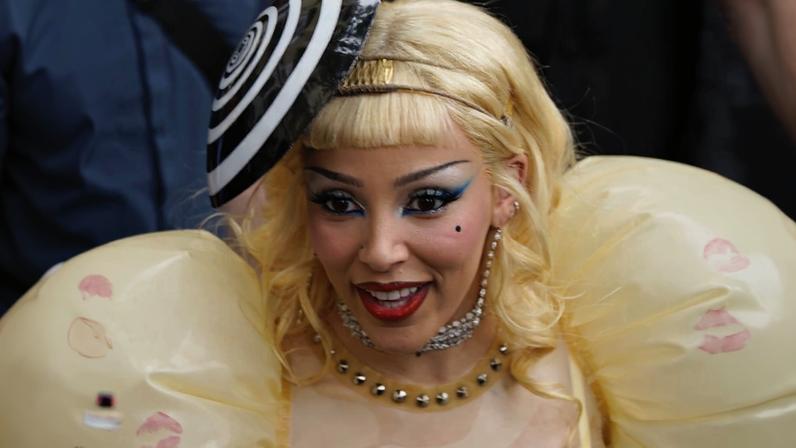 Doja Cat wowed in sheer latex for an appearance at a Sephora store in Paris on Monday.