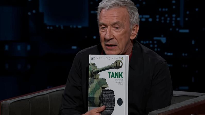 Tim Allen reacting to a "Tank" book gift on Jimmy Kimmel Live.