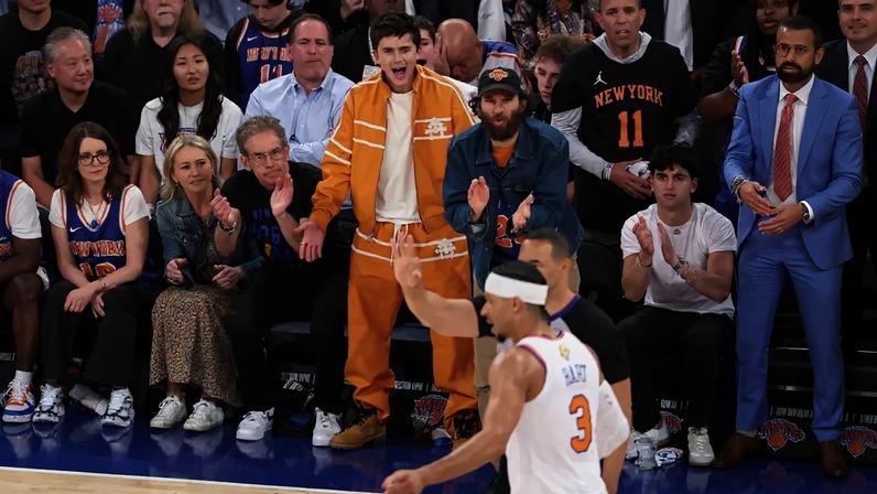 Timothée Chalamet chose a custom Chrome Hearts orange tracksuit for the NBA finals game on Monday night.