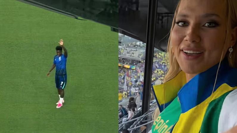 Vini Jr acena para Virginia Fonseca do gramado durante Brasil x Haiti na Copa