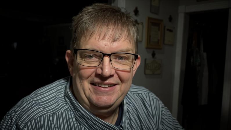 “Coffee Time with John and Momma” influencer John Davis (seen above) died at age 55 after suffering a medical episode during a livestream.